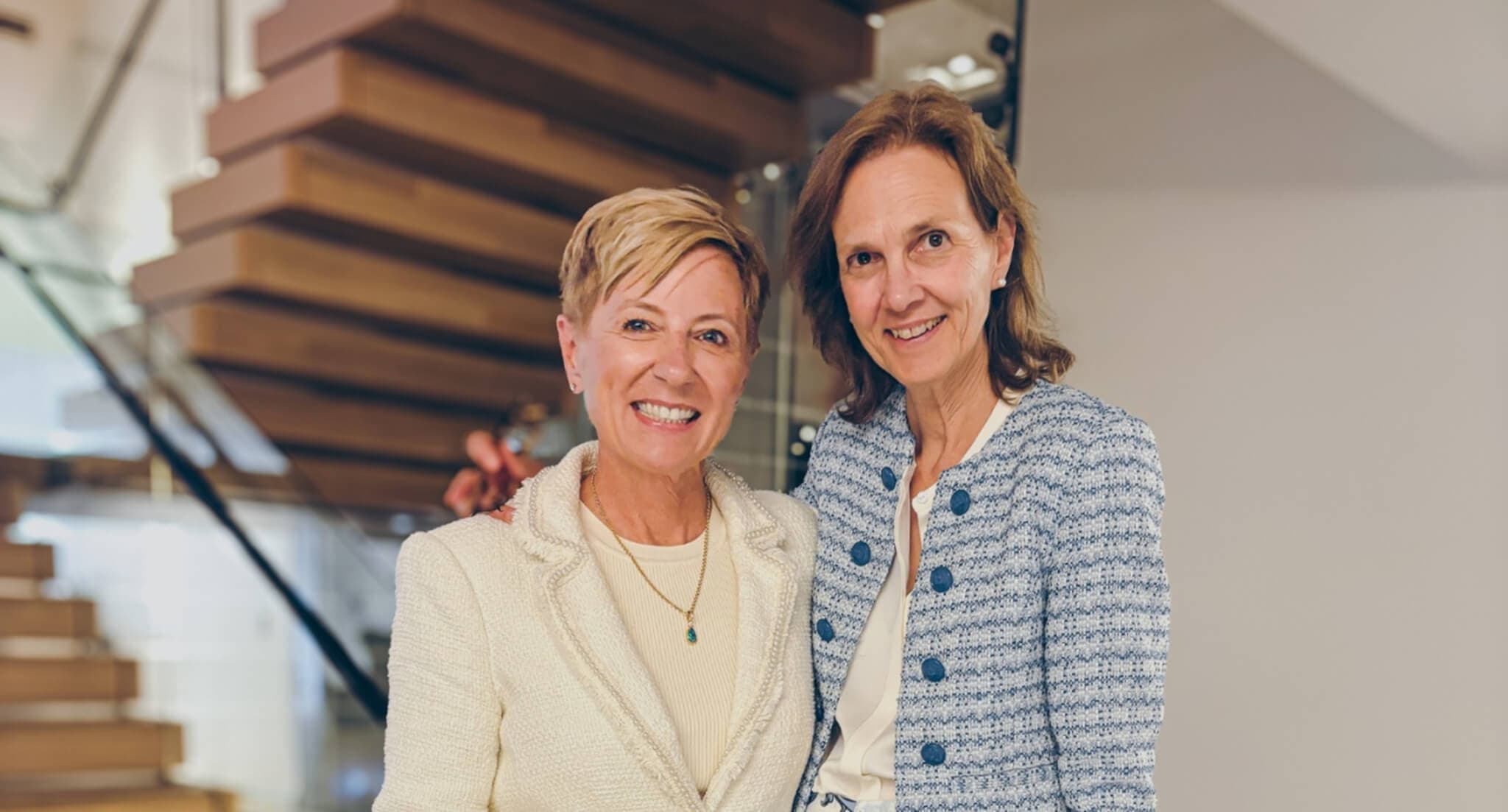 Picture of Susan Howe and Karen Pugliese smiling at the camera.